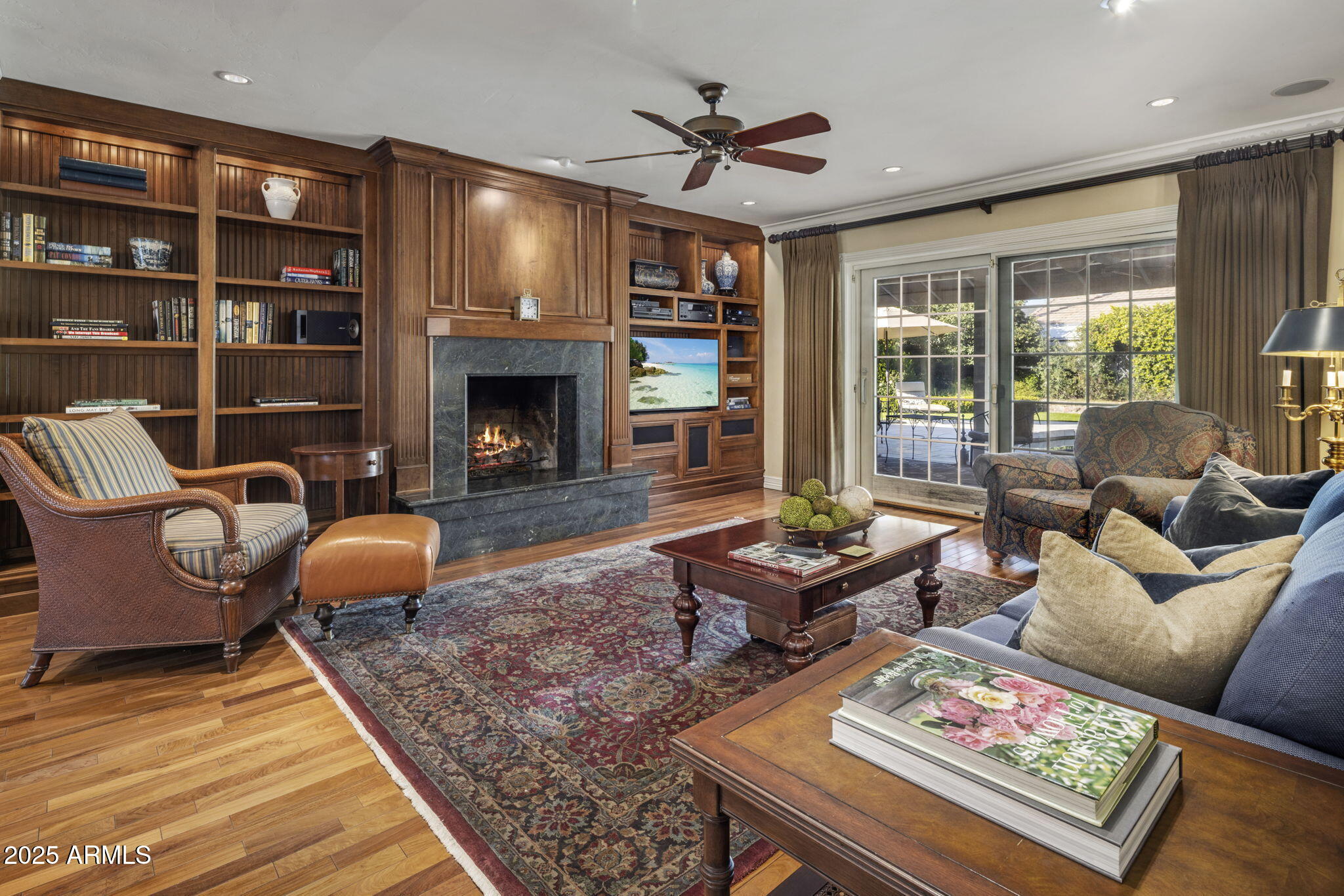 516 West Lawrence Road Phoenix, AZ 85013 - Photo 11 of 65 a living room with furniture a rug and a fireplace