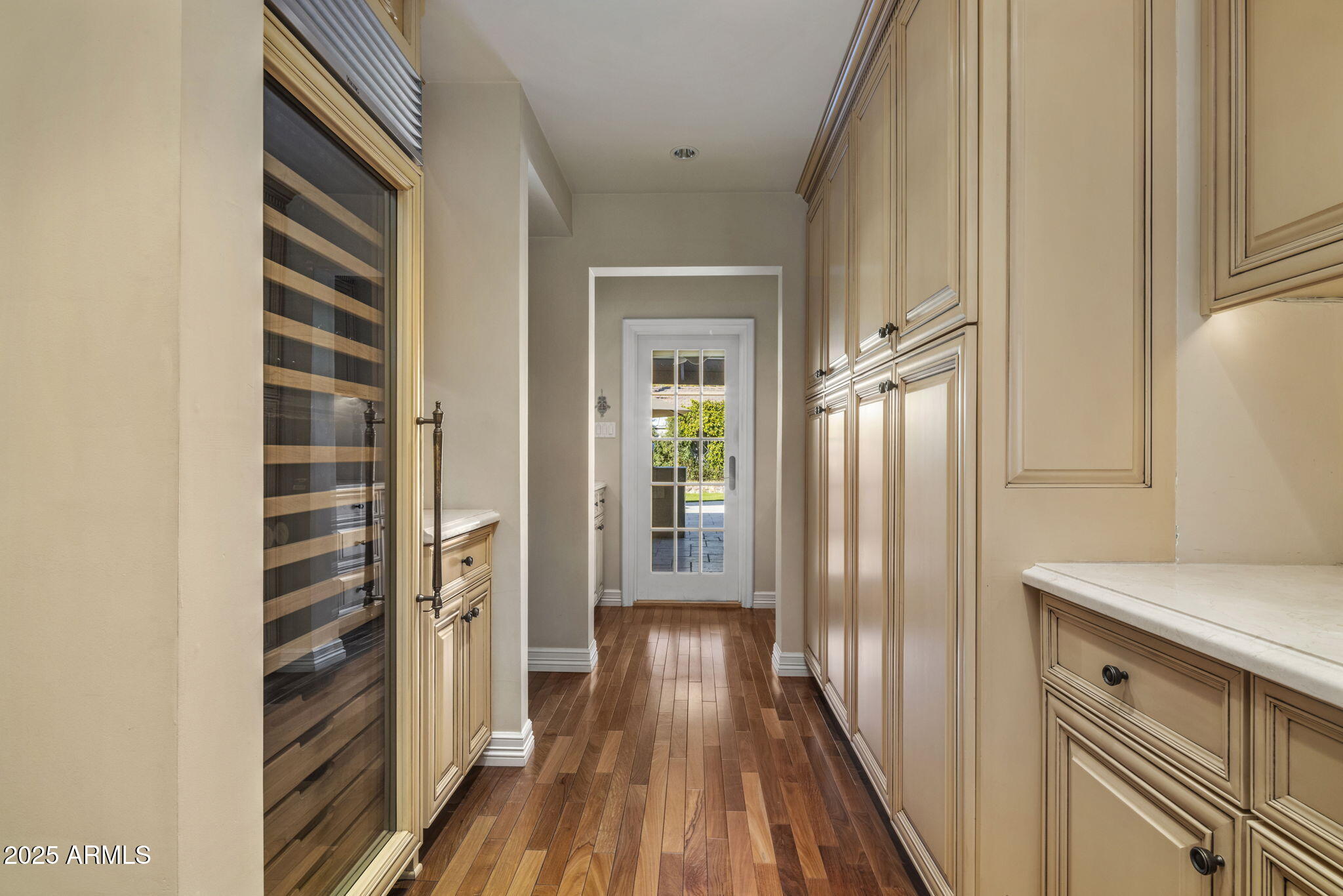 516 West Lawrence Road Phoenix, AZ 85013 - Photo 17 of 65 a view of a hallway with wooden floor and staircase