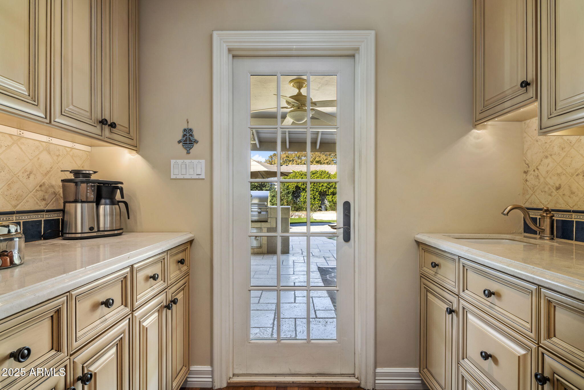 516 West Lawrence Road Phoenix, AZ 85013 - Photo 18 of 65 a kitchen with cabinets and window