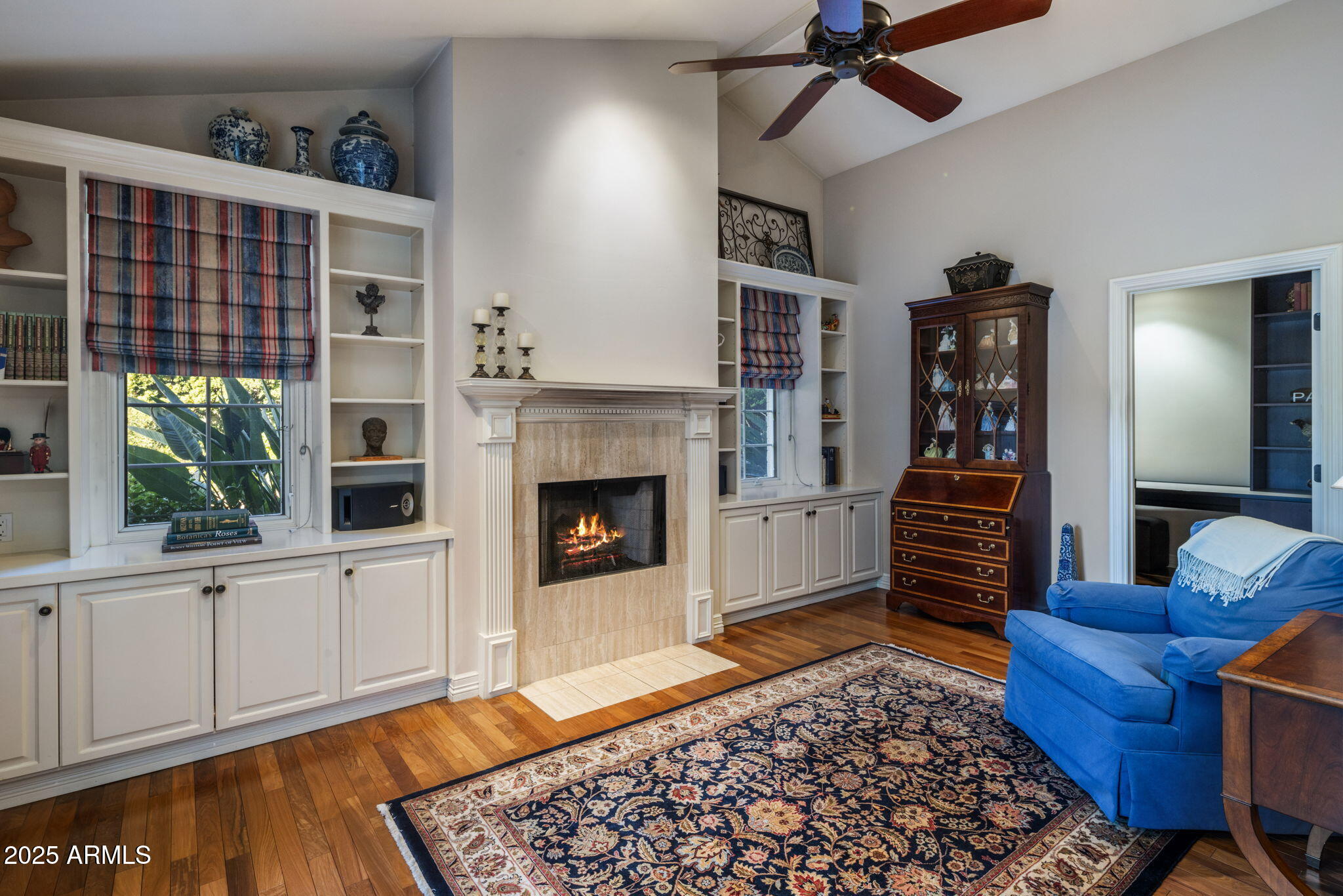 516 West Lawrence Road Phoenix, AZ 85013 - Photo 21 of 65 a living room with furniture and a fireplace