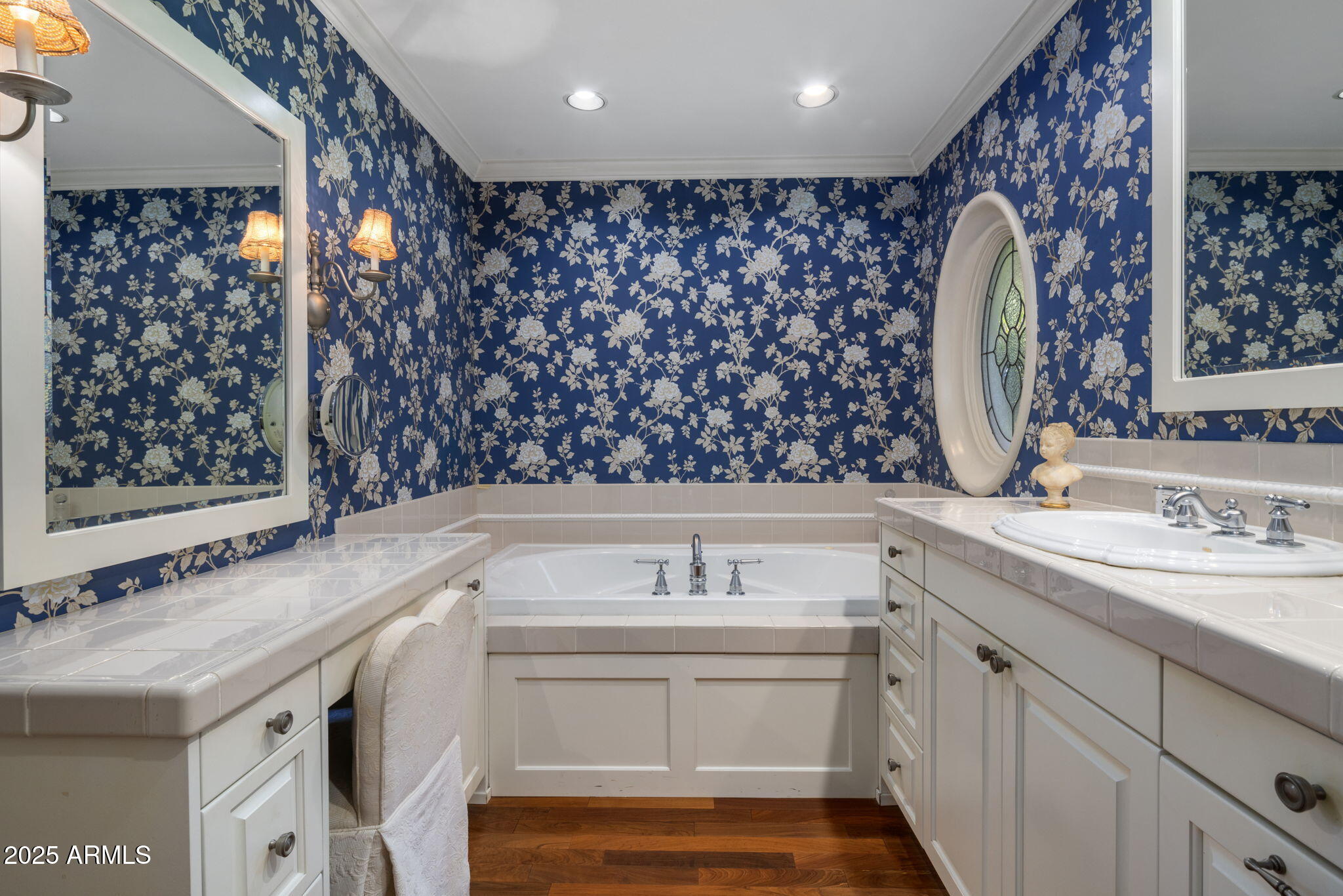 516 West Lawrence Road Phoenix, AZ 85013 - Photo 24 of 65 a bathroom with a sink and a mirror
