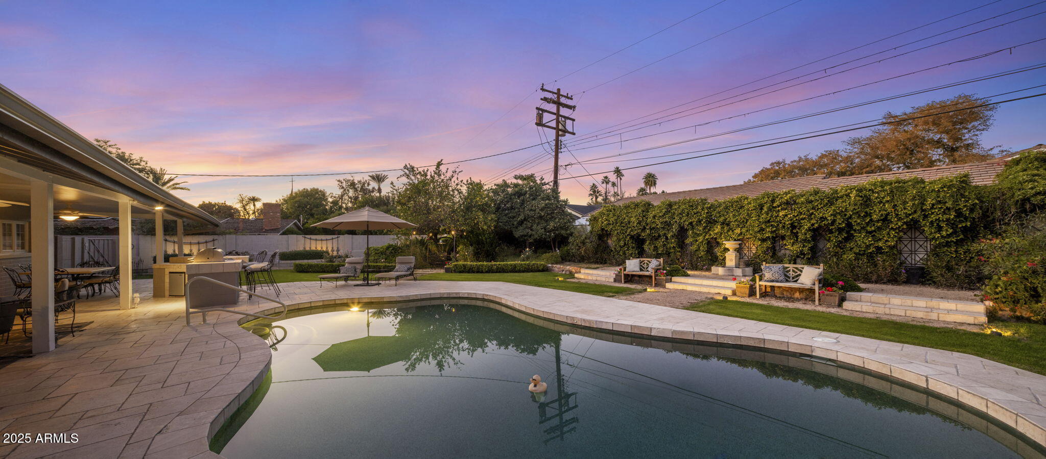516 West Lawrence Road Phoenix, AZ 85013 - Photo 41 of 65 a view of a swimming pool with a patio
