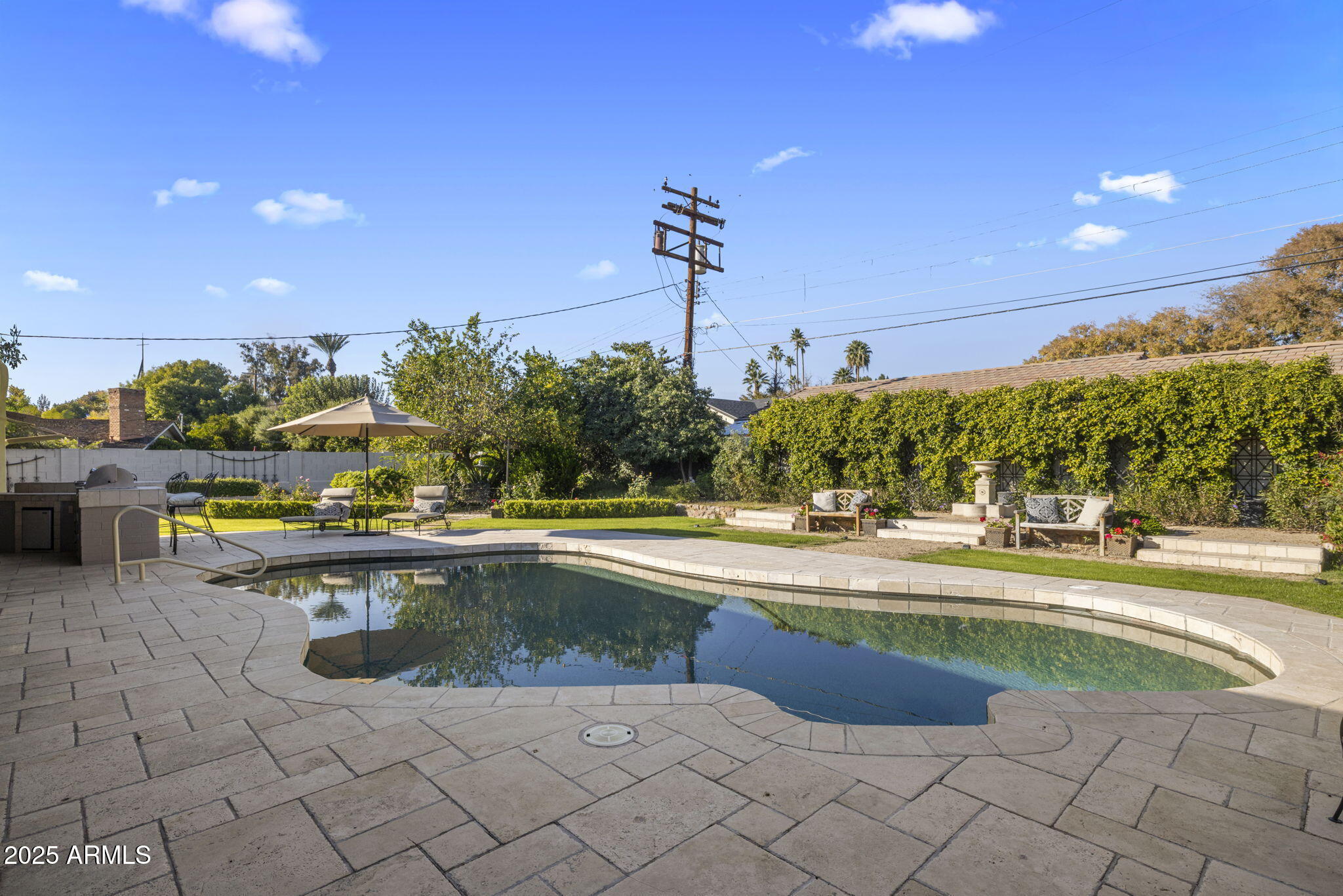 516 West Lawrence Road Phoenix, AZ 85013 - Photo 46 of 65 a view of a swimming pool and a outdoor space