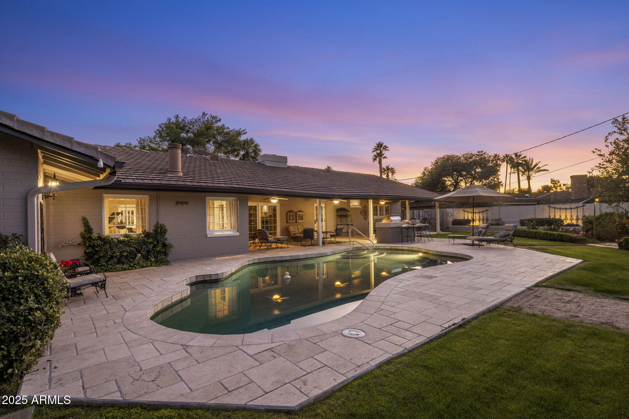 516 West Lawrence Road Phoenix, AZ 85013 - Photo 48 of 65 a view of a house with backyard patio and swimming pool