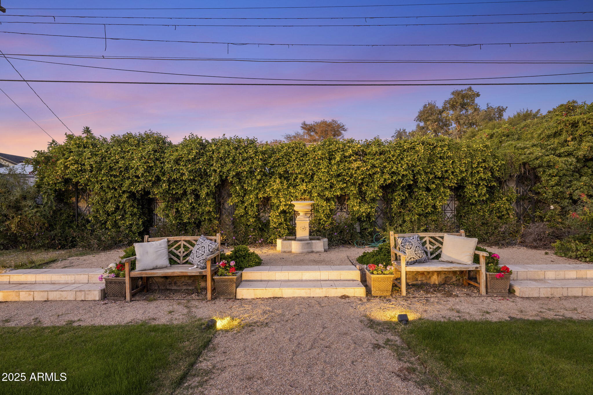 516 West Lawrence Road Phoenix, AZ 85013 - Photo 50 of 65 a roof deck with a table and potted plants with wooden fence