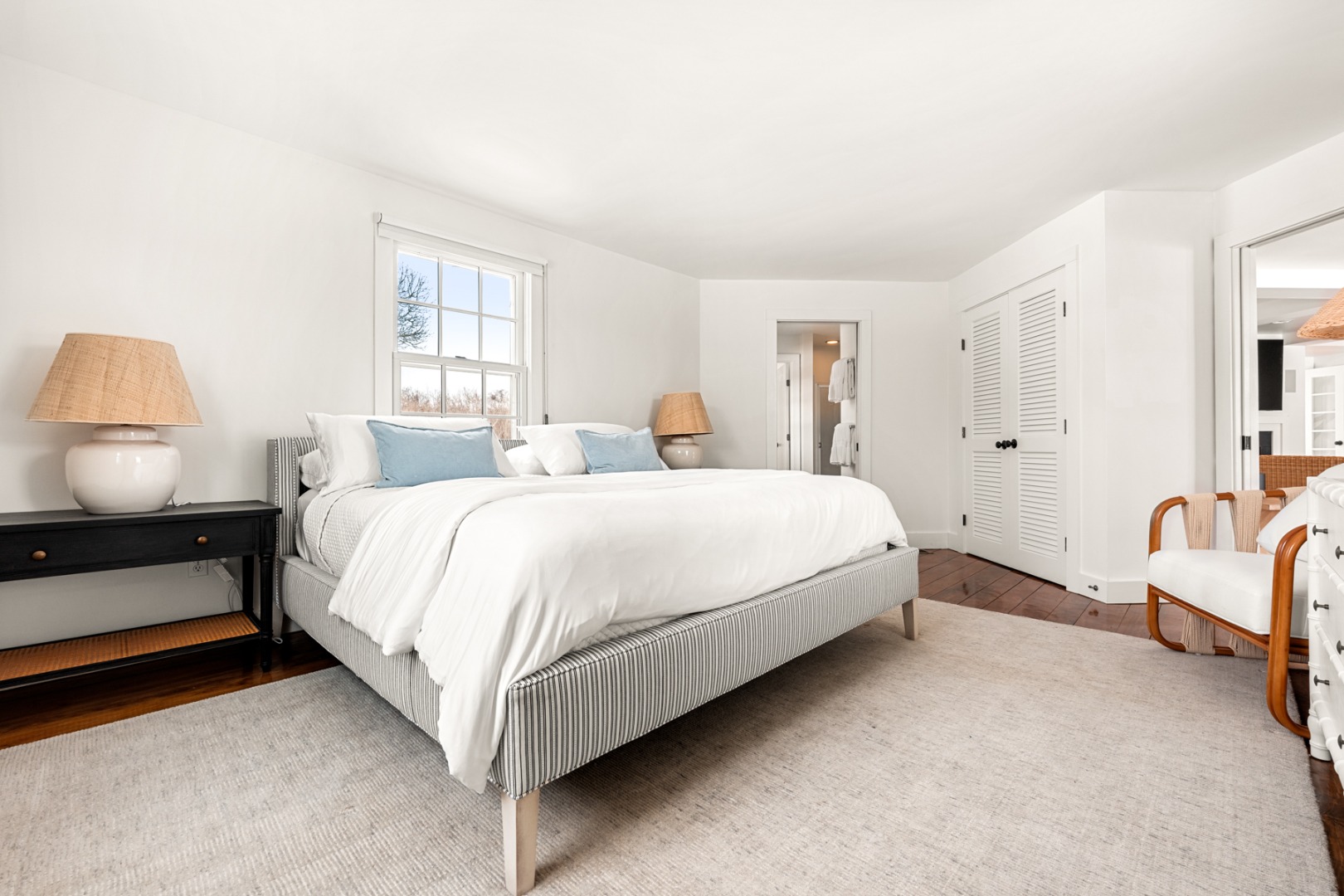 6 Fargo Way Nantucket, MA 02554 - Photo 13 of 28 a bedroom with bed and a lamp with window