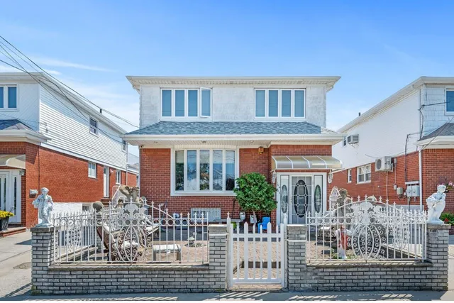 a front view of a building with glass windows