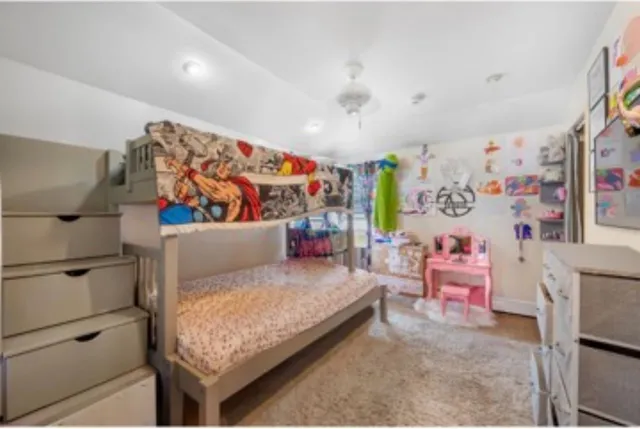 a bedroom with a bed and furniture