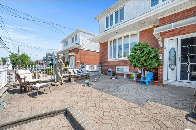 a view of a building with sitting area
