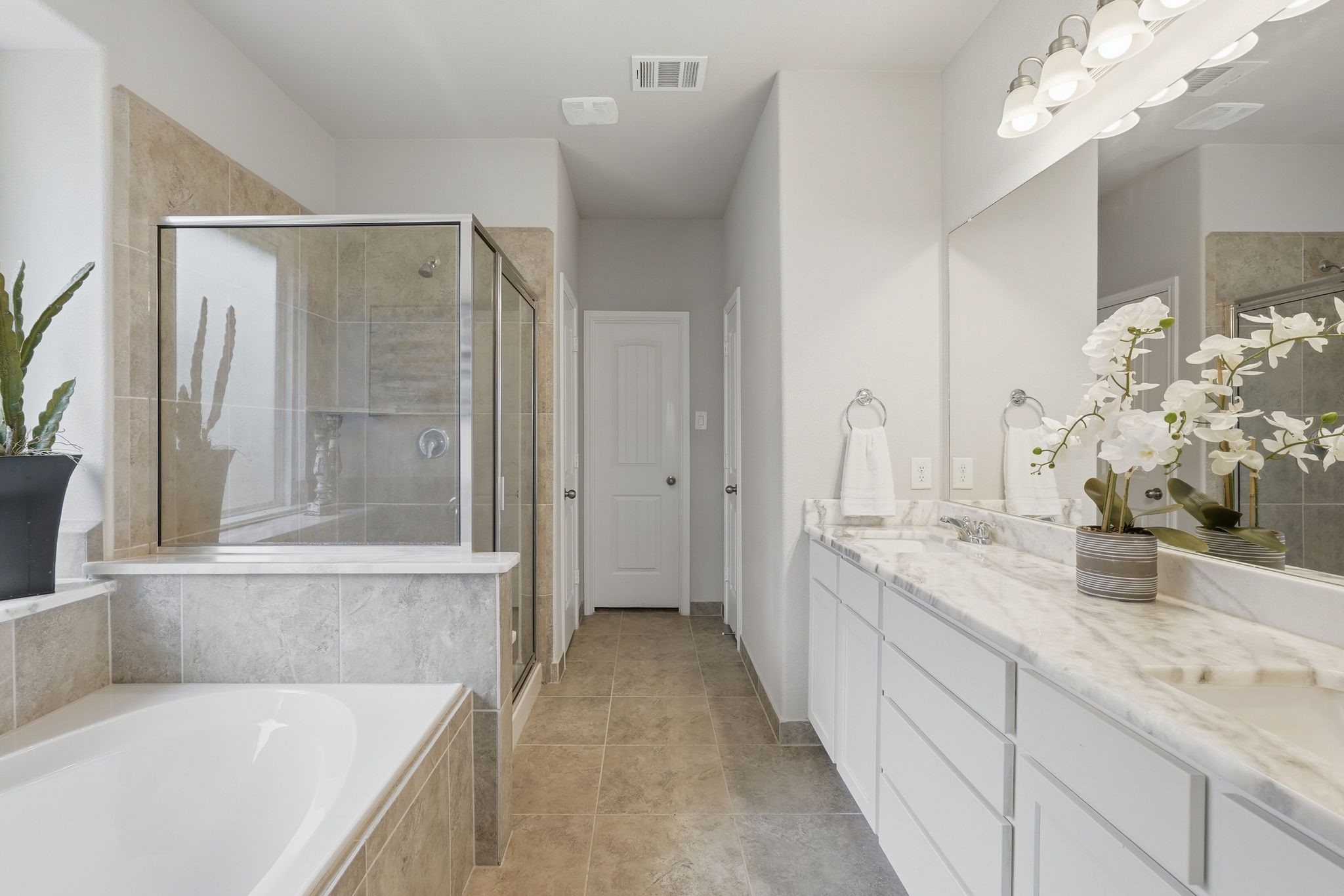 7522 Windsor View Drive Spring, TX 77379 - Photo 26 of 49 Private primary suite filled with natural light and backyard views.