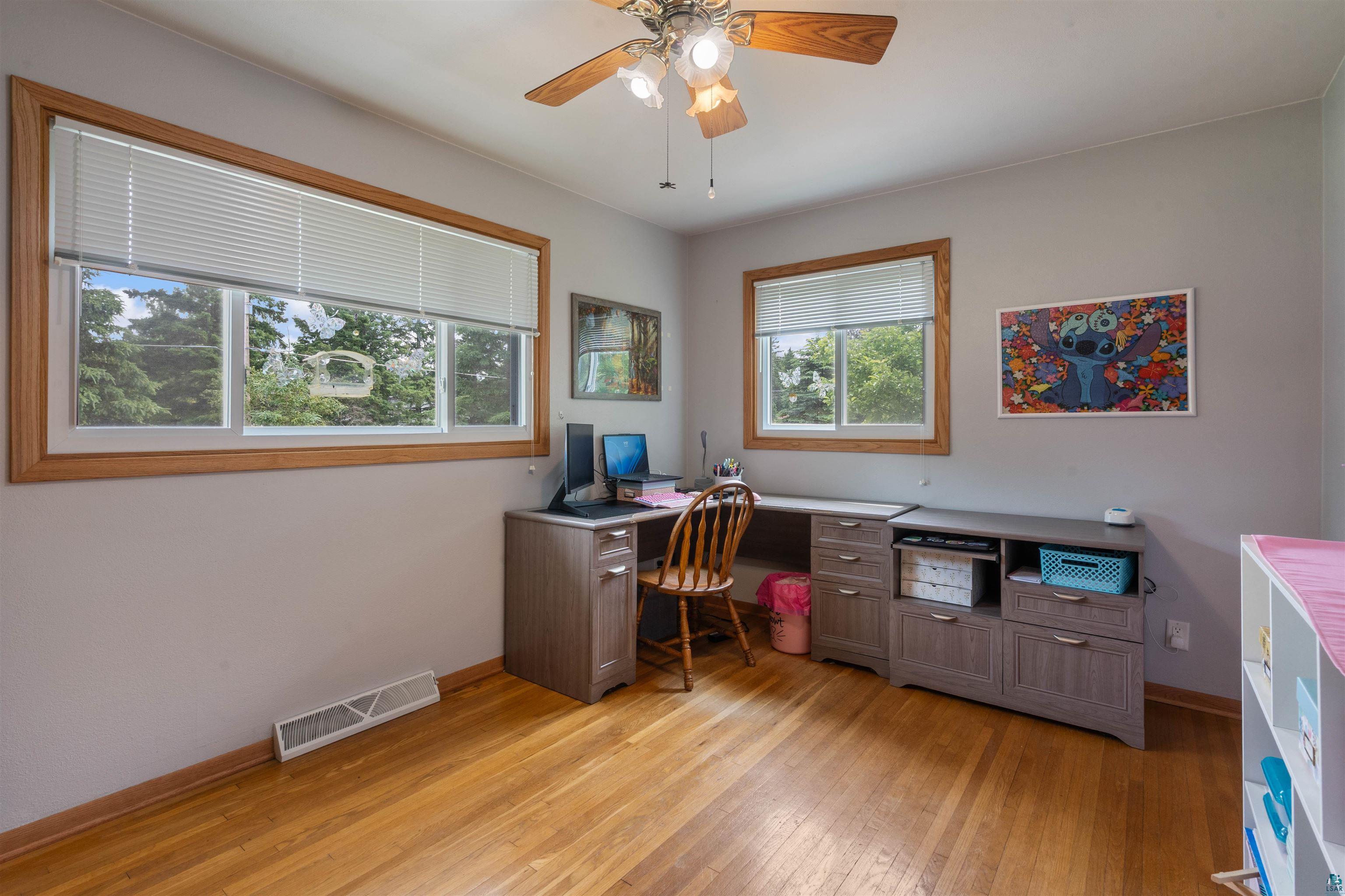 3711 Getchell Road Hermantown, MN 55811 - Photo 16 of 31 Room featuring wood-finish flooring and light-toned walls