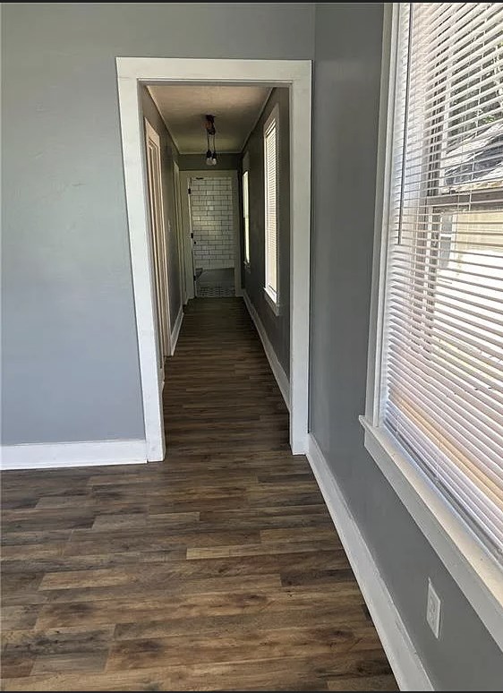 2717 Baldwin Street Columbus, GA 31906 - Photo 5 of 11 a view of a hallway with wooden floor and staircase