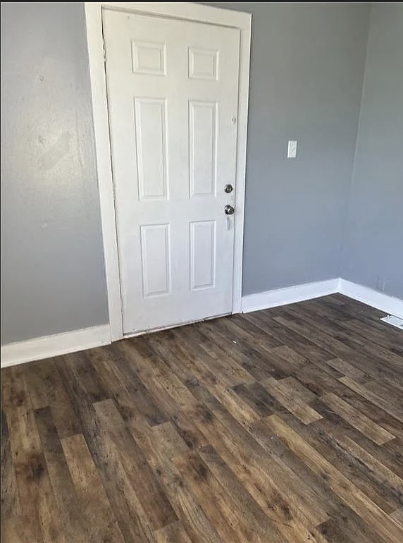 2717 Baldwin Street Columbus, GA 31906 - Photo 7 of 11 an empty room with wooden floor