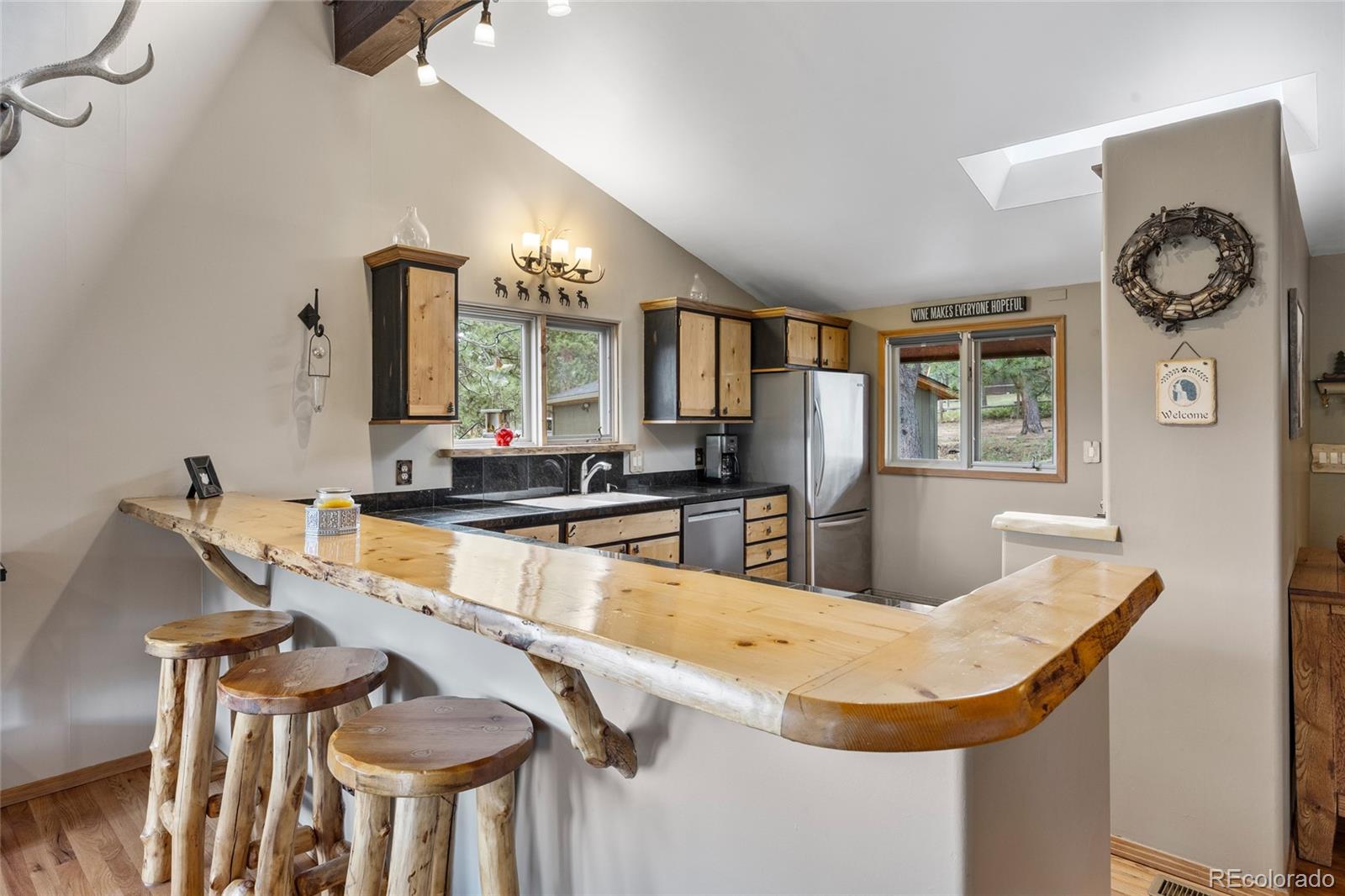 193 Twilight Terrace Drive Bailey, CO 80421 - Photo 13 of 50 a room with dining table and chairs