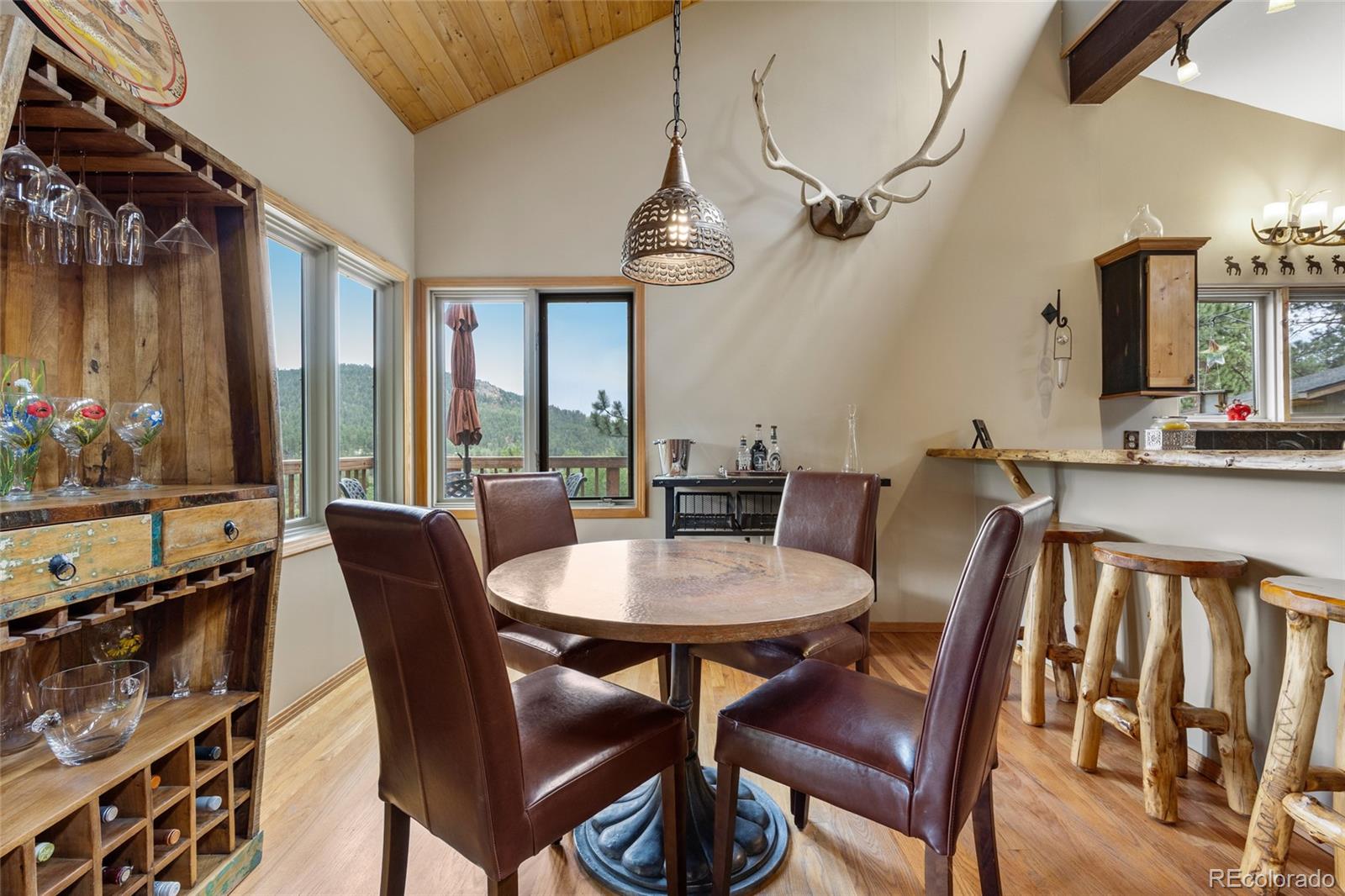 193 Twilight Terrace Drive Bailey, CO 80421 - Photo 14 of 50 a view of a dining room with furniture window and outside view