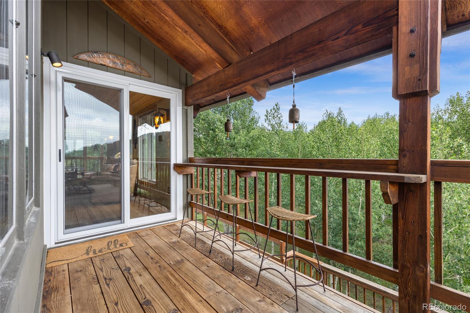 193 Twilight Terrace Drive Bailey, CO 80421 - Photo 16 of 50 a view of balcony with wooden floor