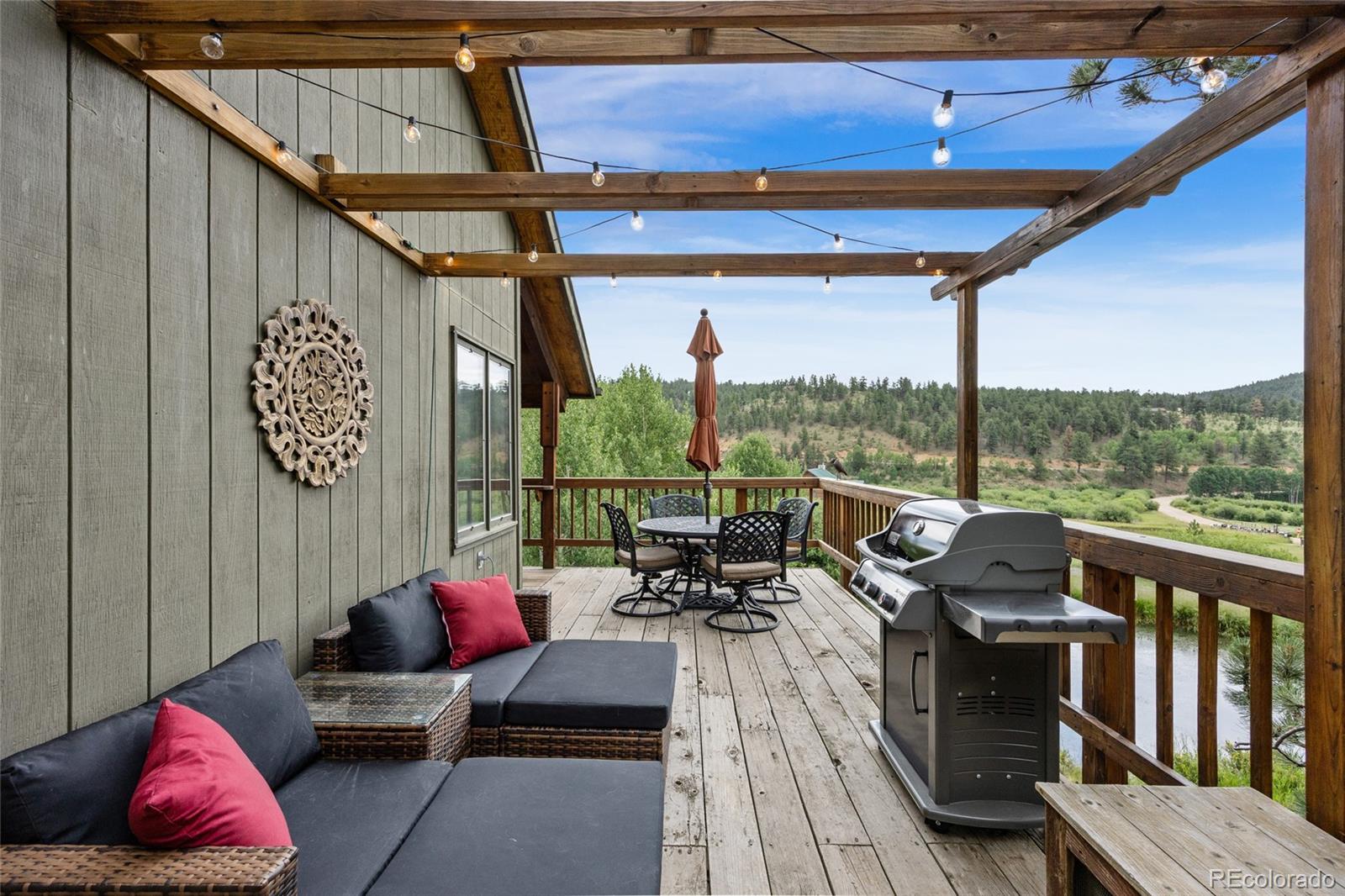 193 Twilight Terrace Drive Bailey, CO 80421 - Photo 19 of 50 a view of balcony with couch