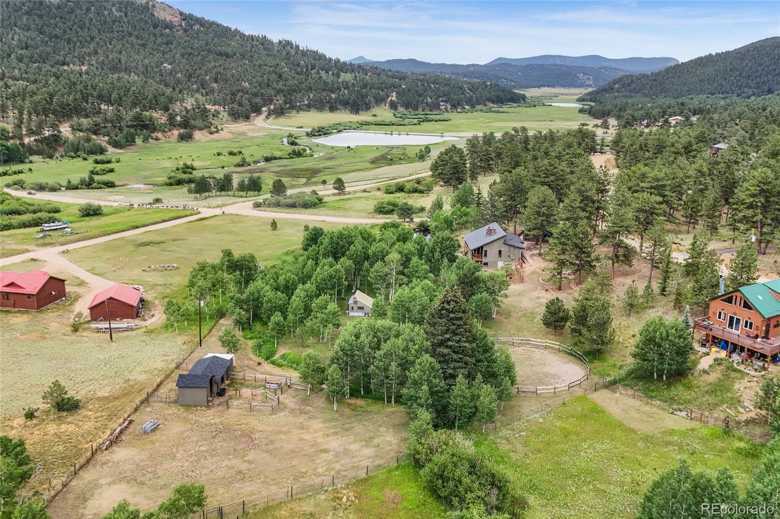 193 Twilight Terrace Drive Bailey, CO 80421 - Photo 2 of 50 a view of a lake with a mountain