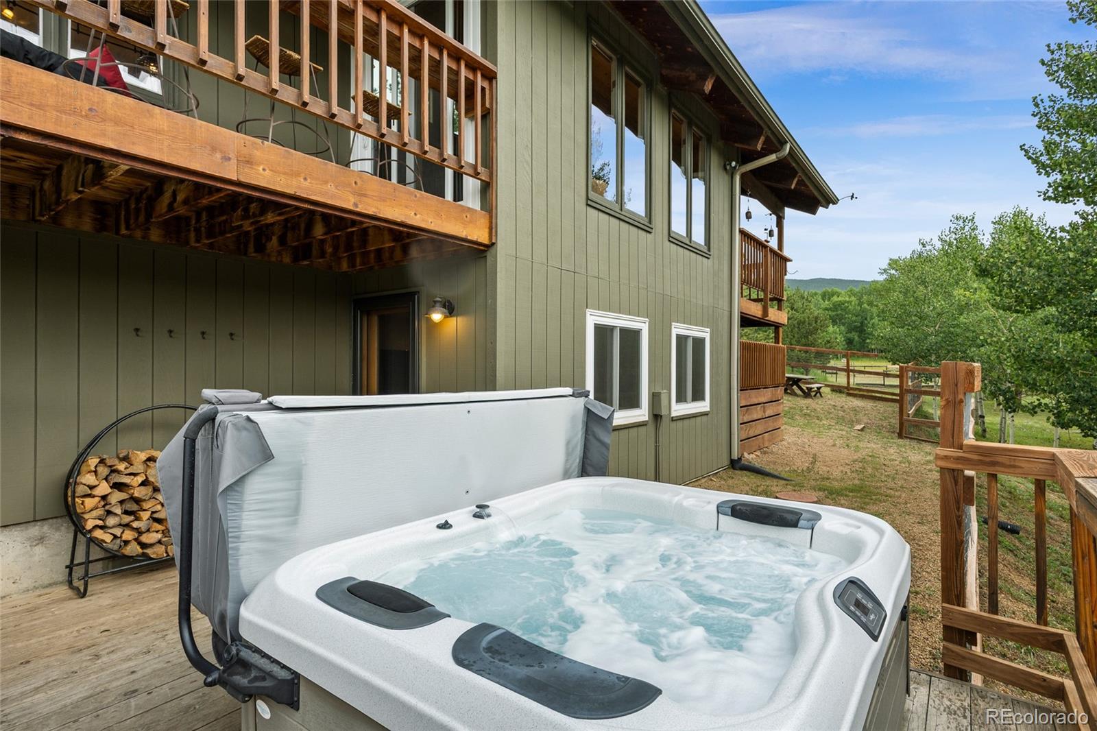 193 Twilight Terrace Drive Bailey, CO 80421 - Photo 27 of 50 a terrace of a house with outdoor seating