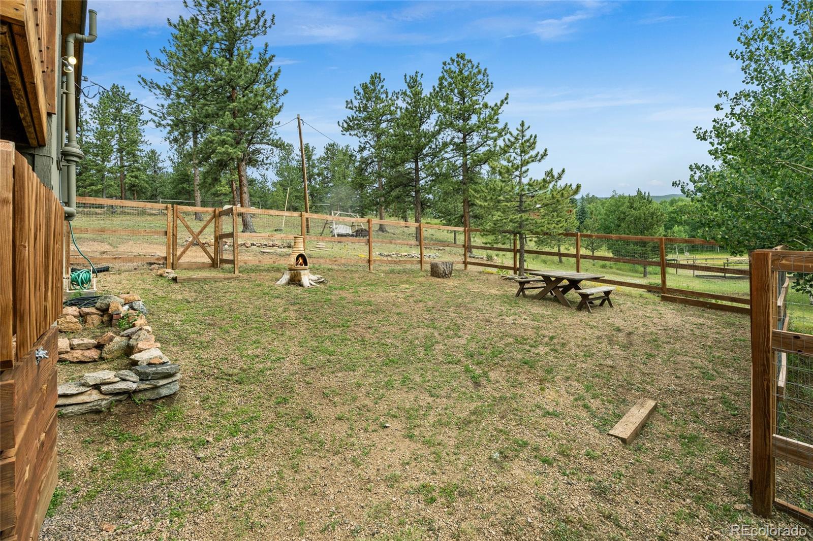 193 Twilight Terrace Drive Bailey, CO 80421 - Photo 30 of 50 a view of a bench in the patio