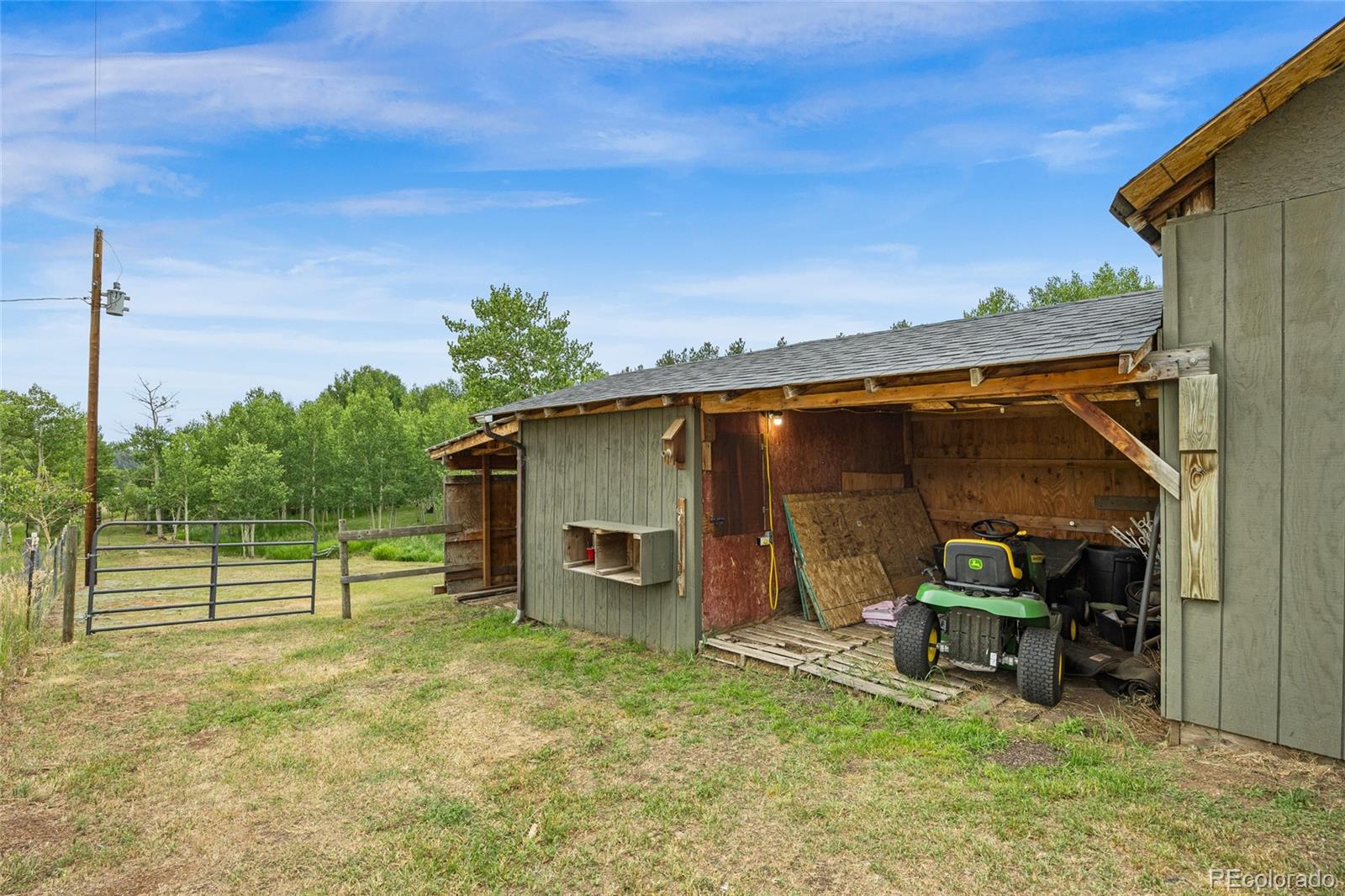 193 Twilight Terrace Drive Bailey, CO 80421 - Photo 39 of 50 a view of a backyard with under an umbrella