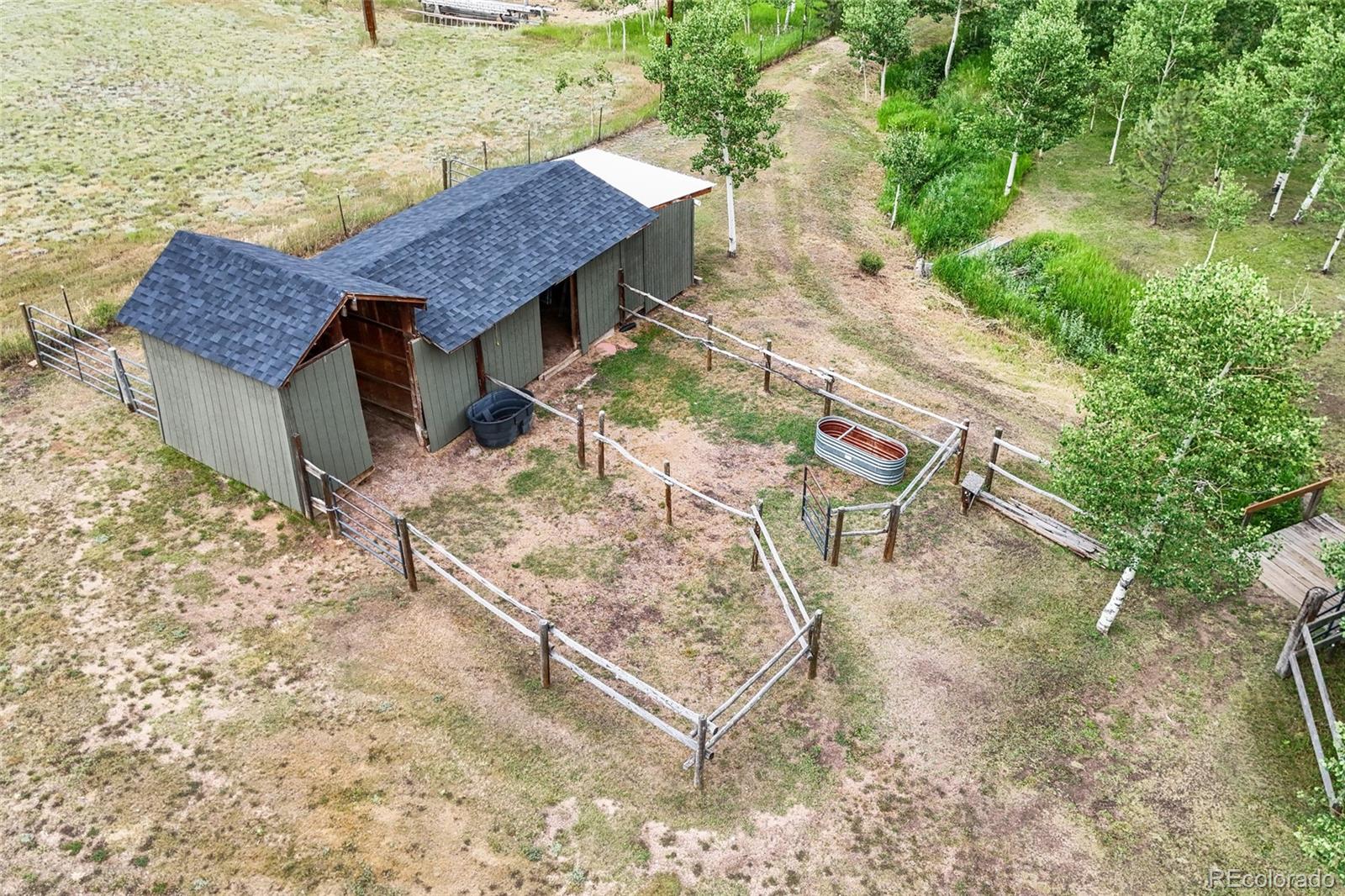 193 Twilight Terrace Drive Bailey, CO 80421 - Photo 40 of 50 a view of a wooden floor with a yard