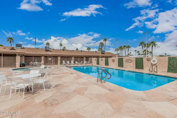 a view of a house with swimming pool