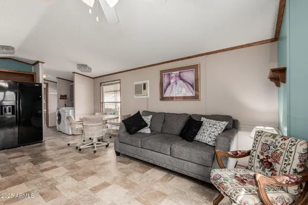 a living room with furniture and a couch
