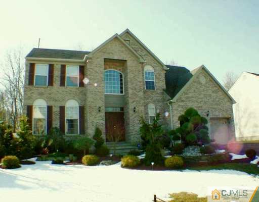 52 Stratton Road Old Bridge, NJ 07747 - Photo 1 of 8 a front view of a house with a yard