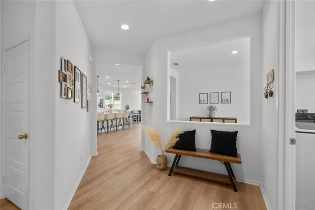 a view of a livingroom with furniture and wooden floor