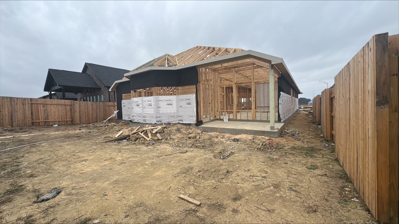 291 Grey Leaf Road Buda, TX 78610 - Photo 4 of 5 Back of house featuring a patio