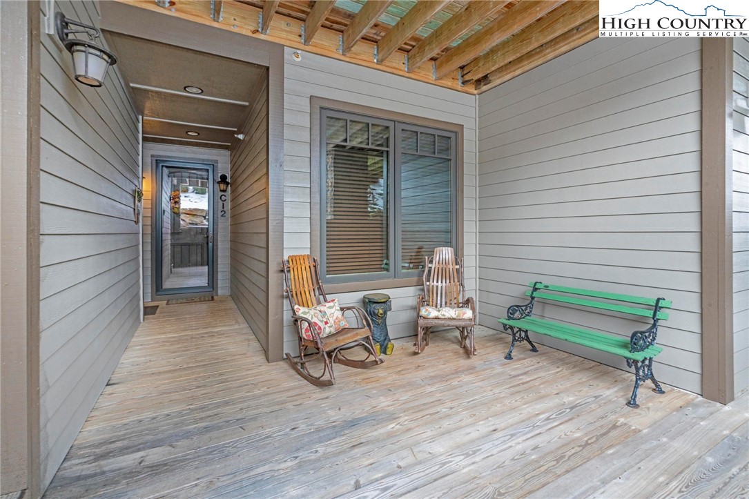 152 Red Tail Summit, Unit CI2 Boone, NC 28607 - Photo 23 of 33 a view of a chairs in a patio
