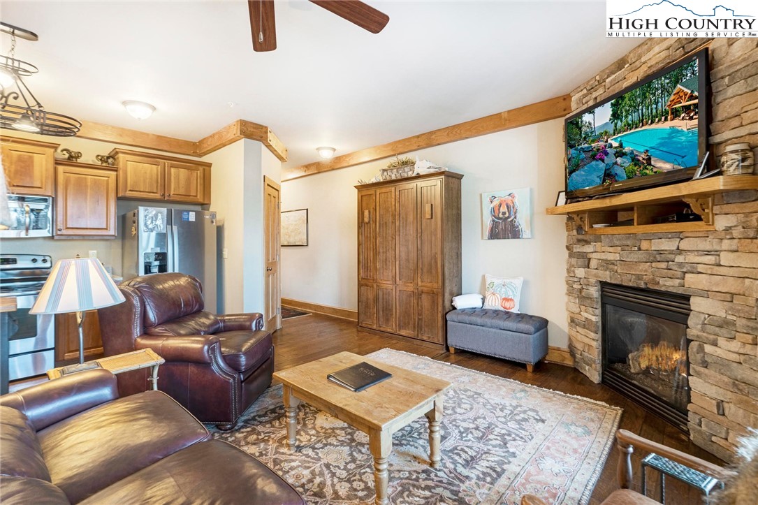 152 Red Tail Summit, Unit CI2 Boone, NC 28607 - Photo 8 of 33 a living room with furniture and a fireplace