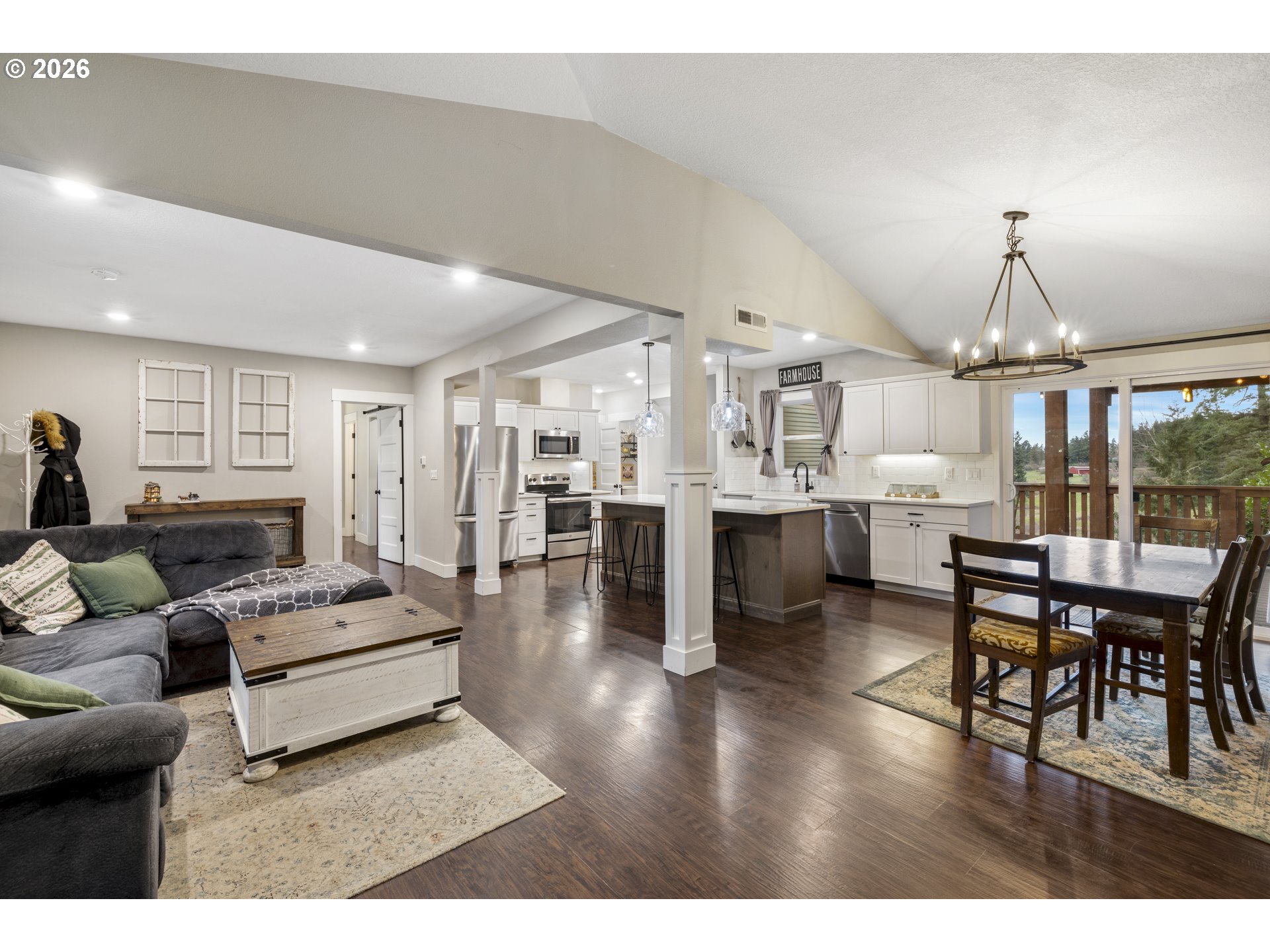 16453 Forsythe Road Oregon City, OR 97045 - Photo 11 of 48 a living room with lots of furniture and kitchen view