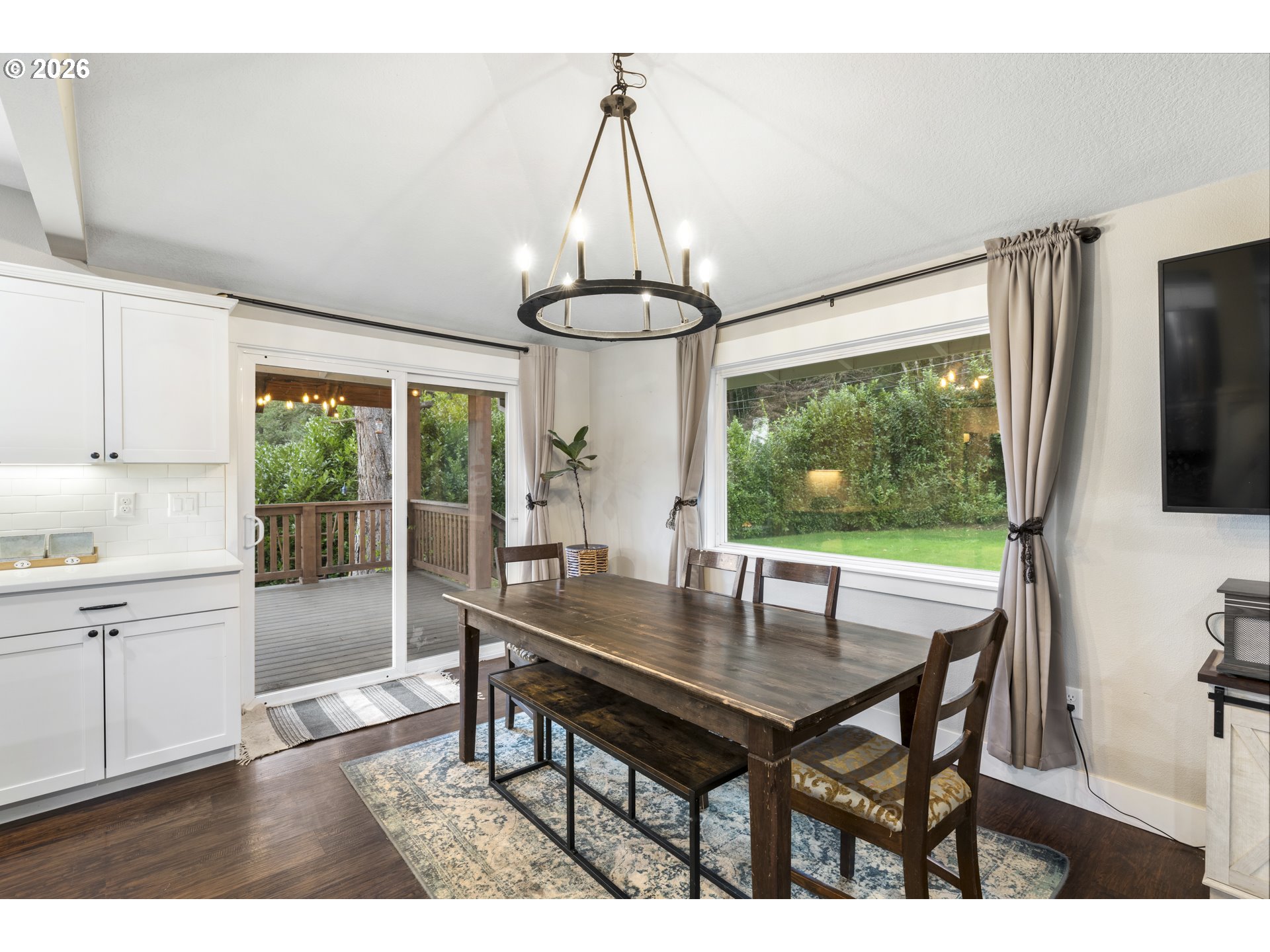 16453 Forsythe Road Oregon City, OR 97045 - Photo 17 of 48 a dining room with furniture window and wooden floor