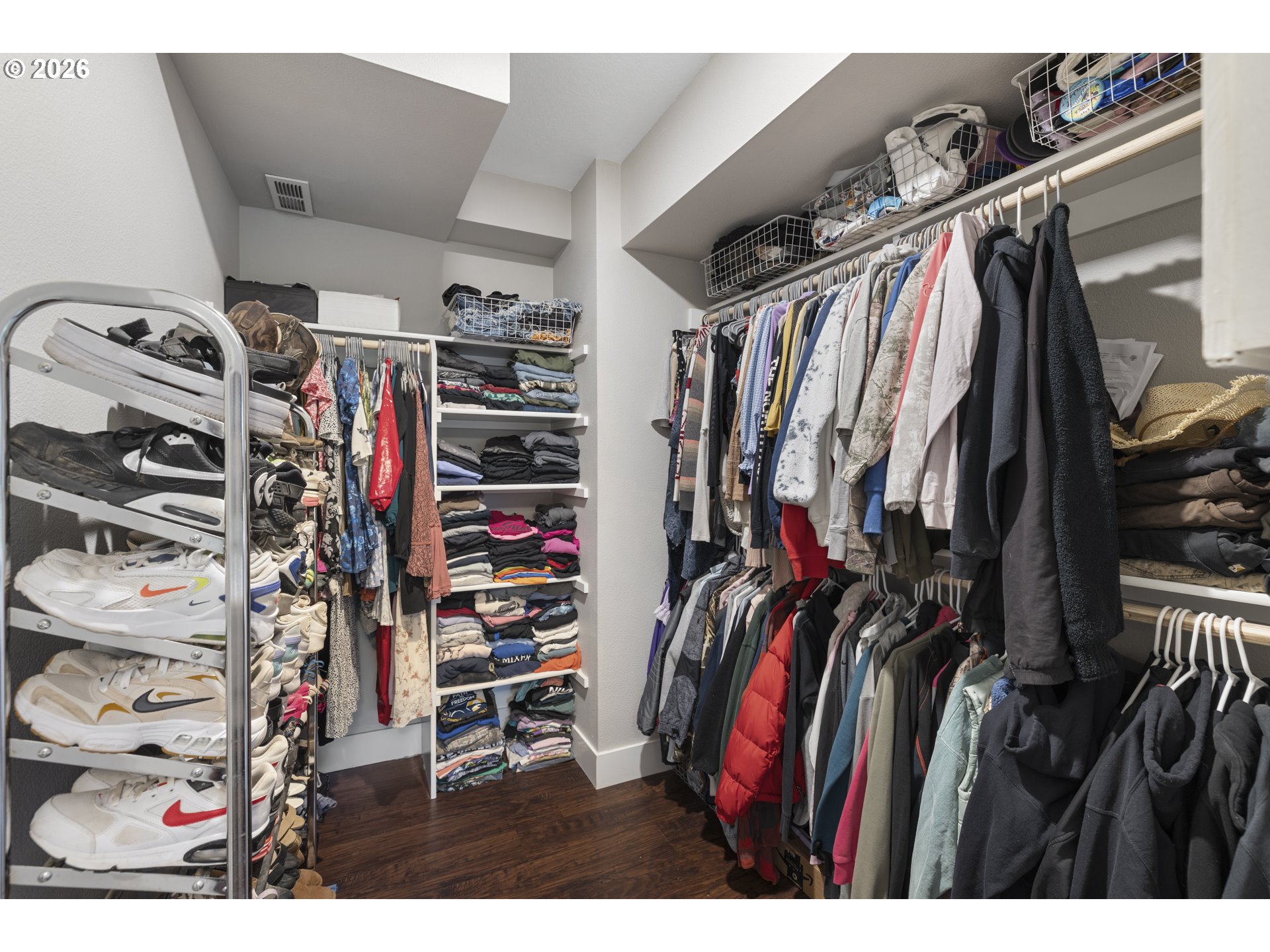 16453 Forsythe Road Oregon City, OR 97045 - Photo 21 of 48 a view of walk in closet with clothes and shoes