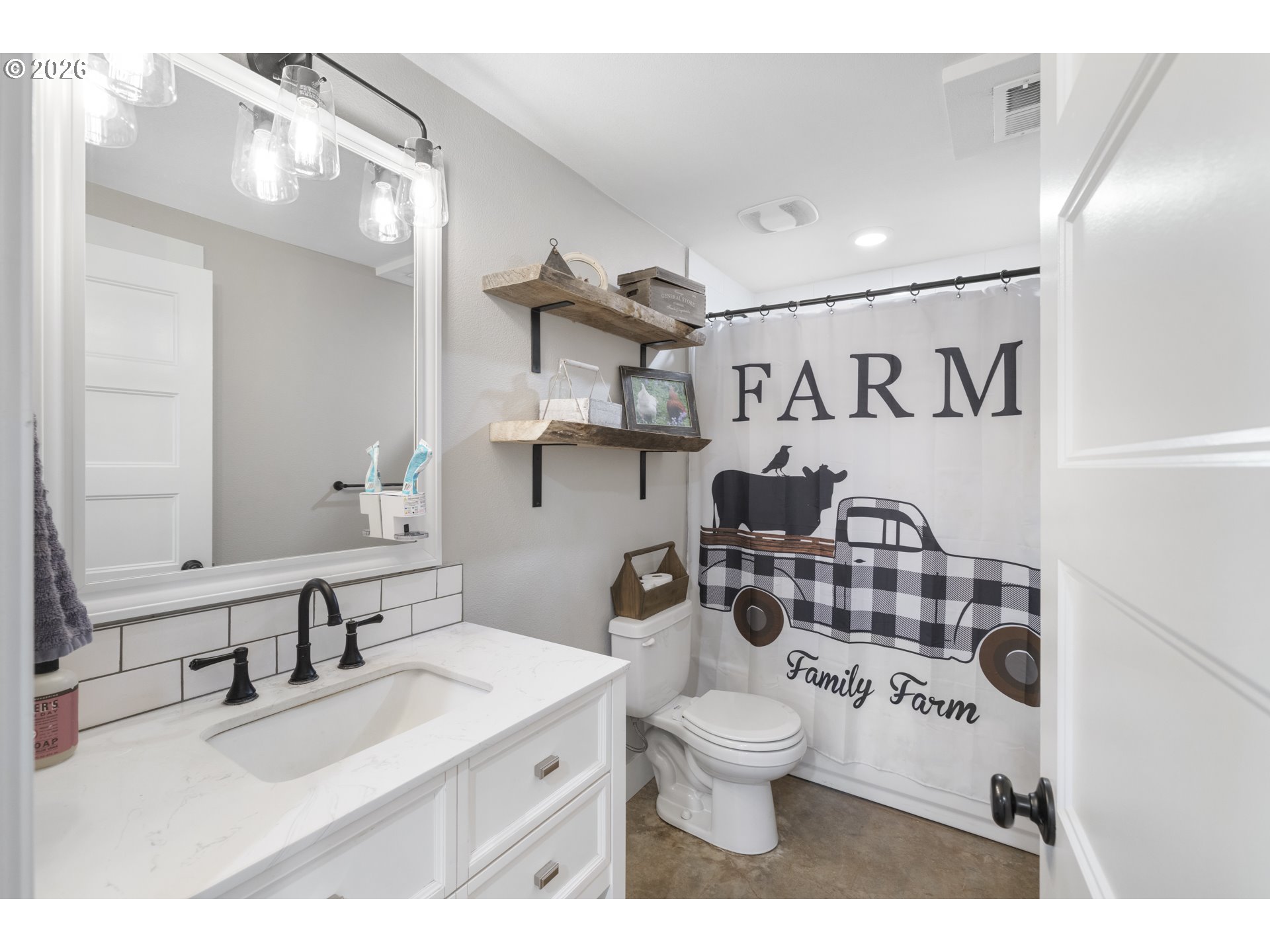 16453 Forsythe Road Oregon City, OR 97045 - Photo 27 of 48 a bathroom with a sink toilet and shower