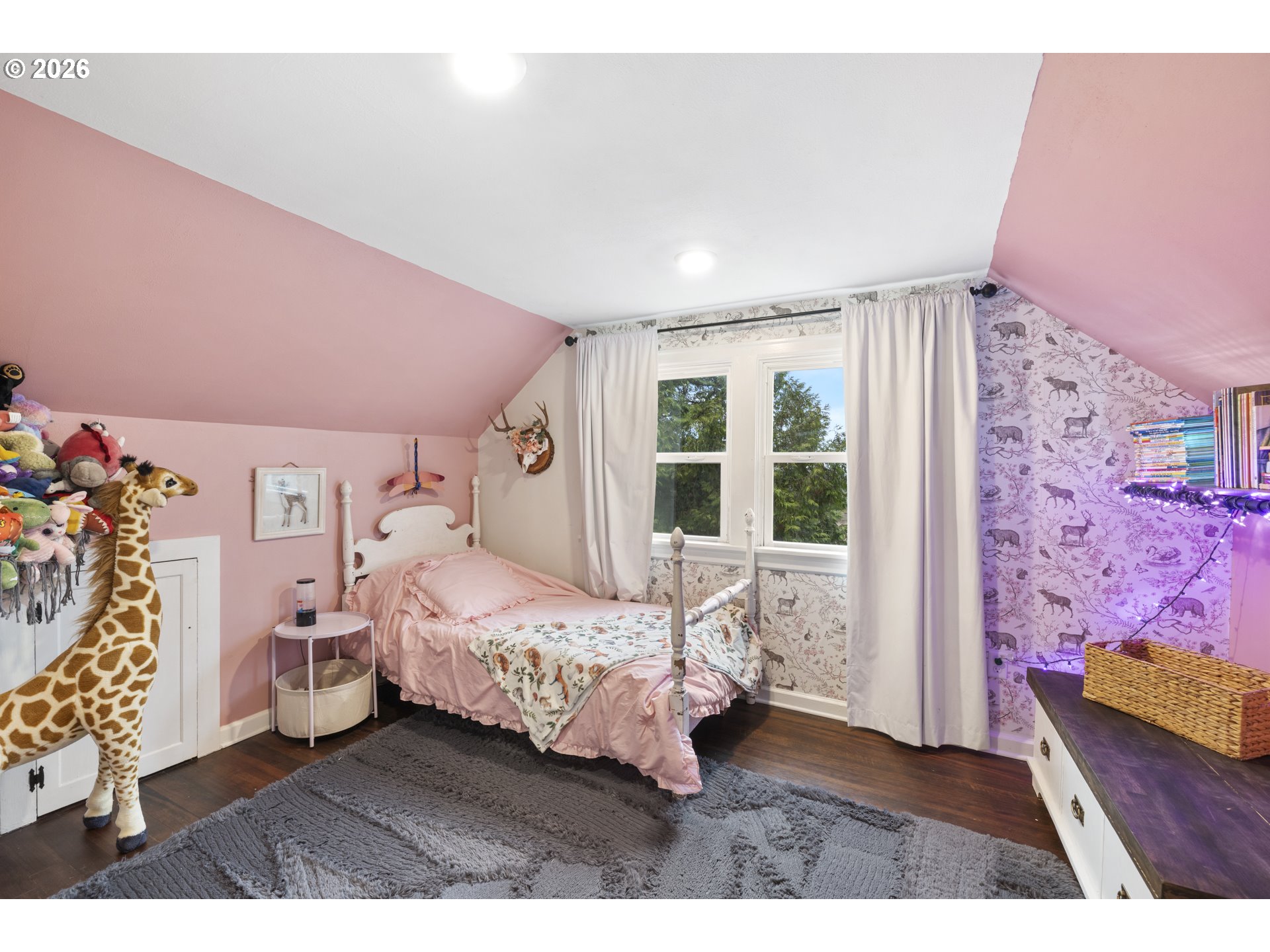 16453 Forsythe Road Oregon City, OR 97045 - Photo 32 of 48 a bedroom with a bed with wooden floor