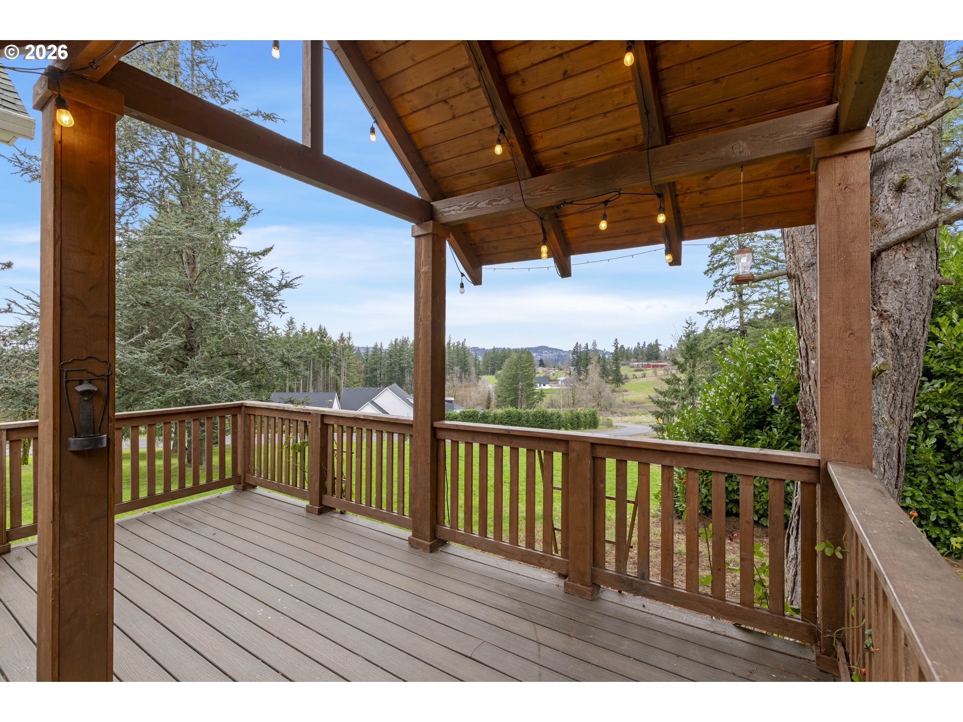16453 Forsythe Road Oregon City, OR 97045 - Photo 39 of 48 a view of a wooden deck with a ocean view