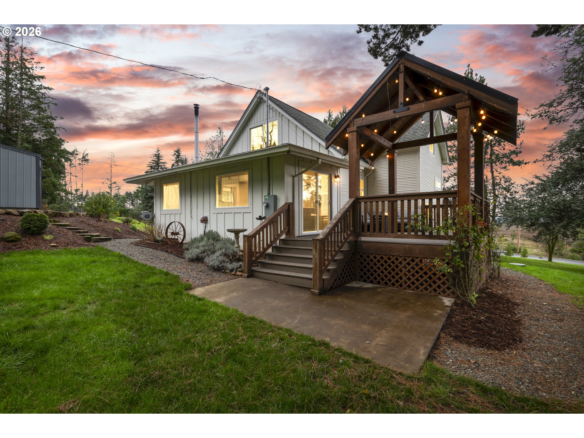 16453 Forsythe Road Oregon City, OR 97045 - Photo 4 of 48 a view of a chair and table in backyard of the house