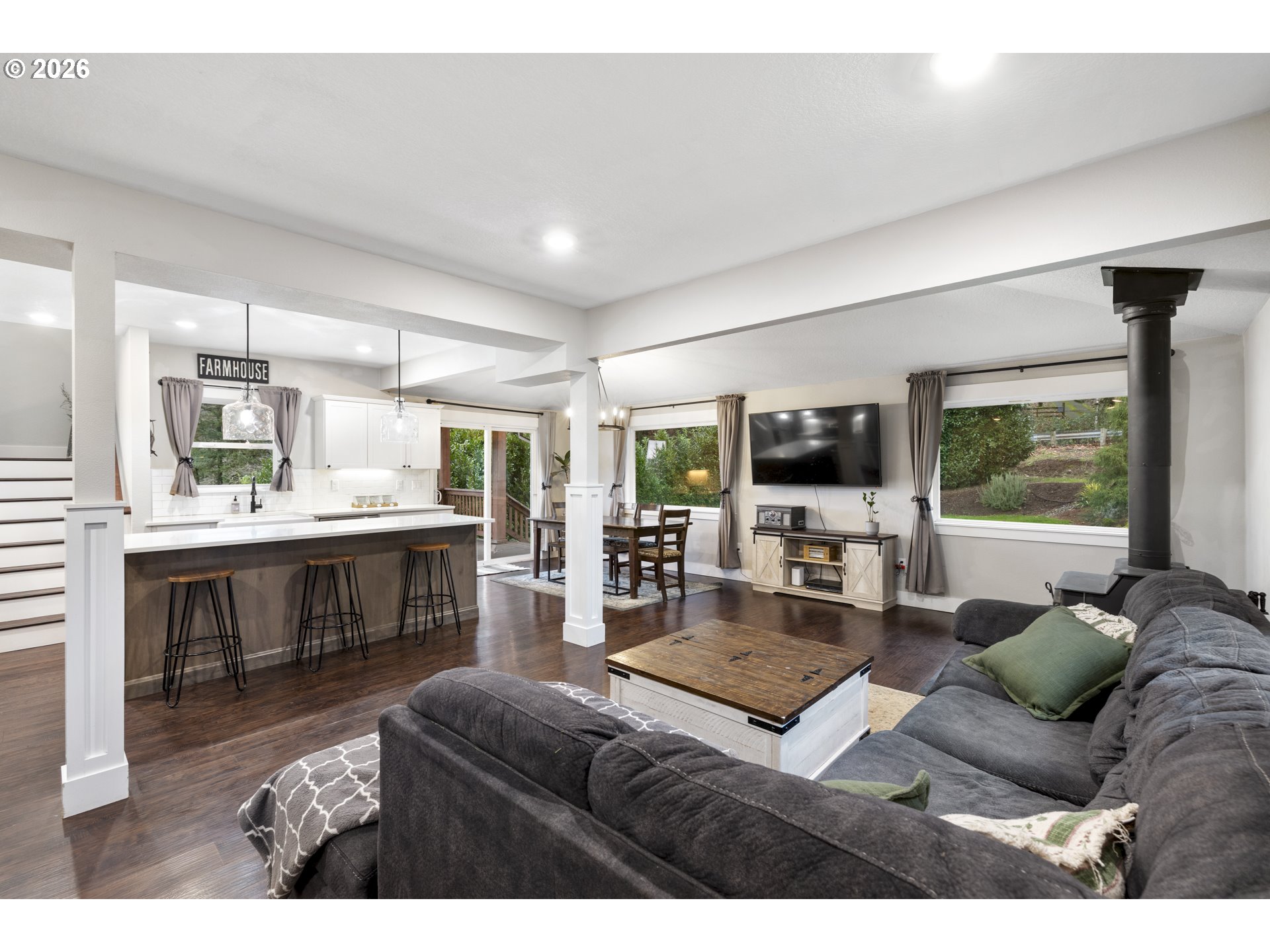 16453 Forsythe Road Oregon City, OR 97045 - Photo 9 of 48 a living room with furniture and a fireplace