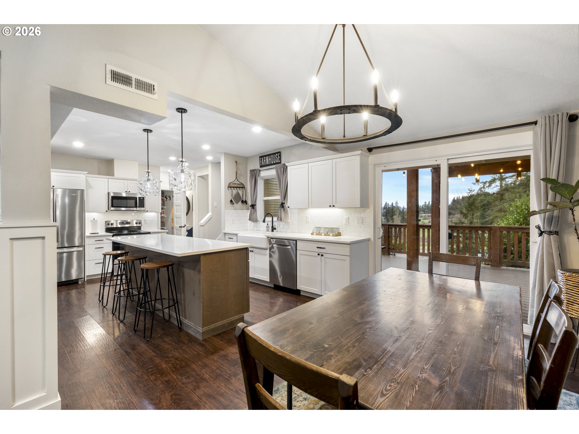 16453 Forsythe Road Oregon City, OR 97045 - Photo 10 of 48 a large kitchen with a table and chairs