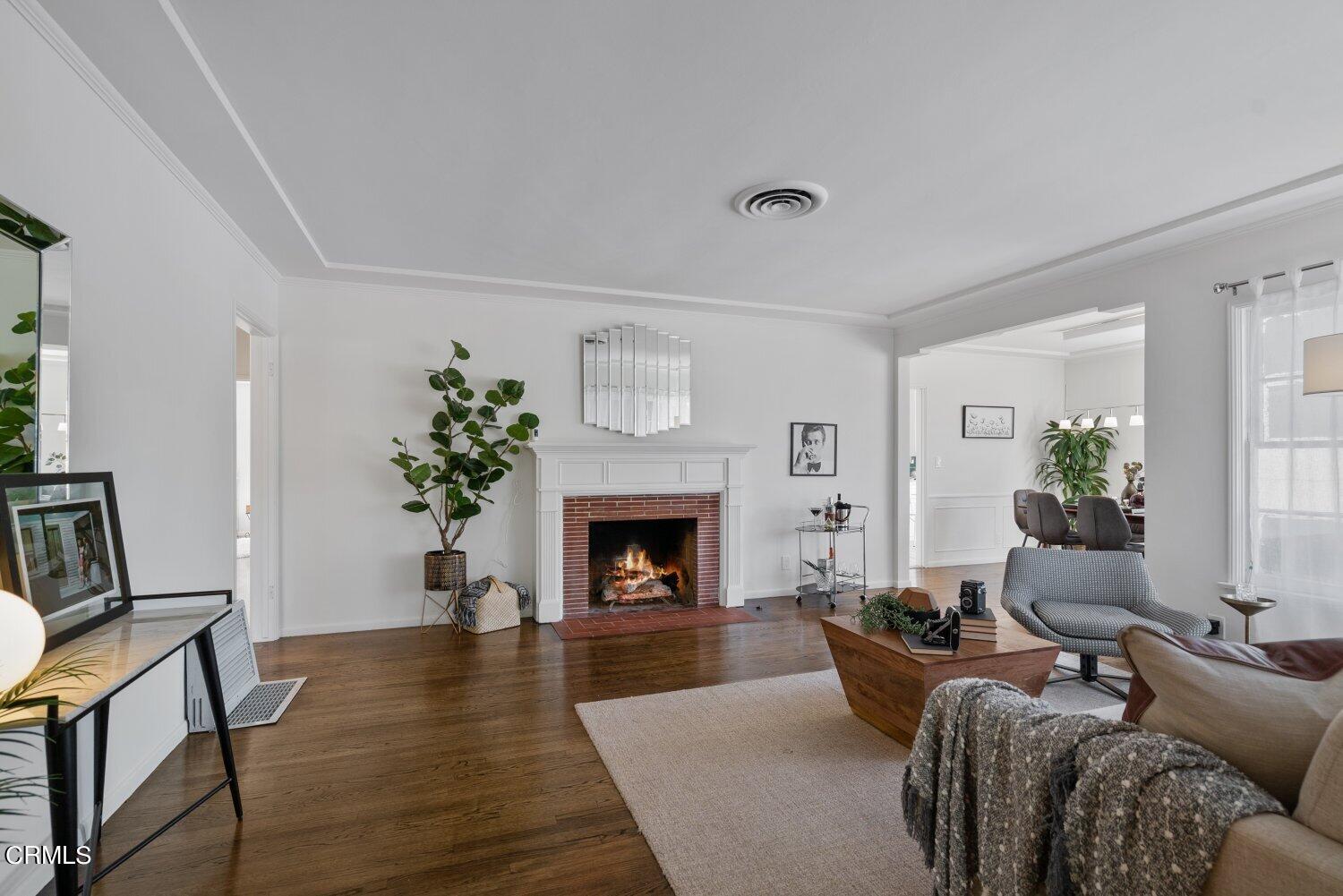 400 Dartmouth Road Burbank, CA 91504 - Photo 1 of 5 a living room with furniture fireplace and window
