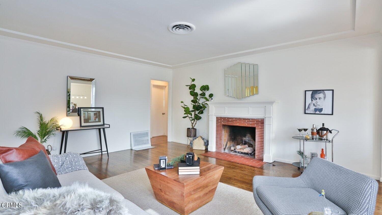400 Dartmouth Road Burbank, CA 91504 - Photo 4 of 5 a living room with furniture and a fireplace