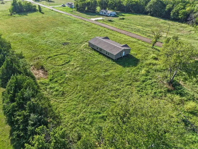 a view of a two house with a yard