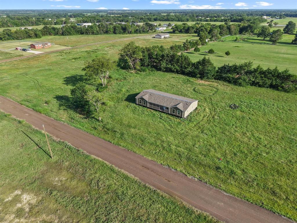 372 Hemby Way Bonham, TX 75418 - Photo 4 of 12 a view of a outdoor space