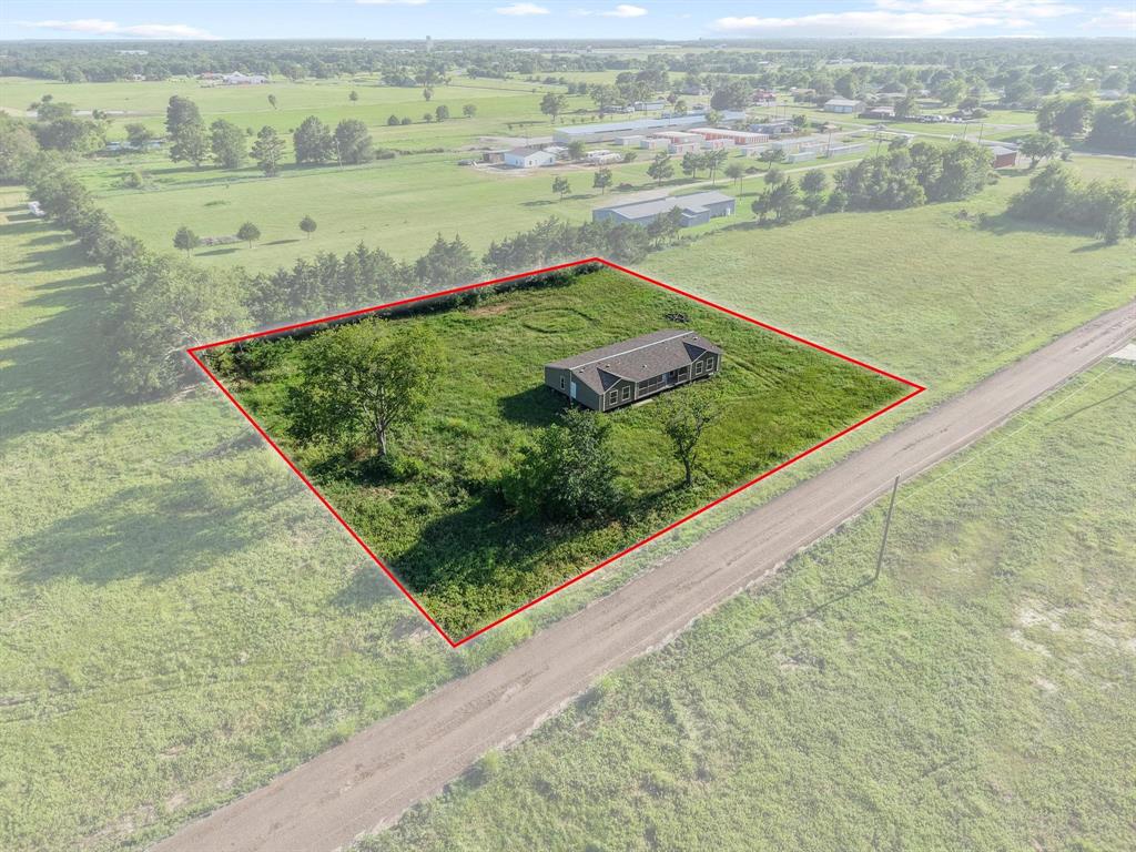 372 Hemby Way Bonham, TX 75418 - Photo 5 of 12 a view of a field with an ocean