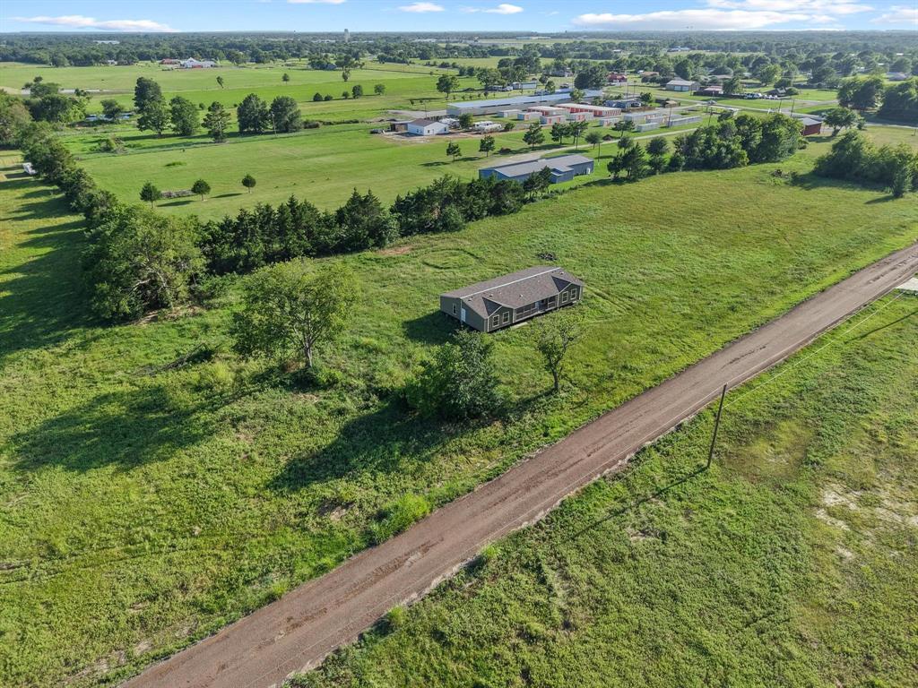 372 Hemby Way Bonham, TX 75418 - Photo 7 of 12 a view of a lush green field