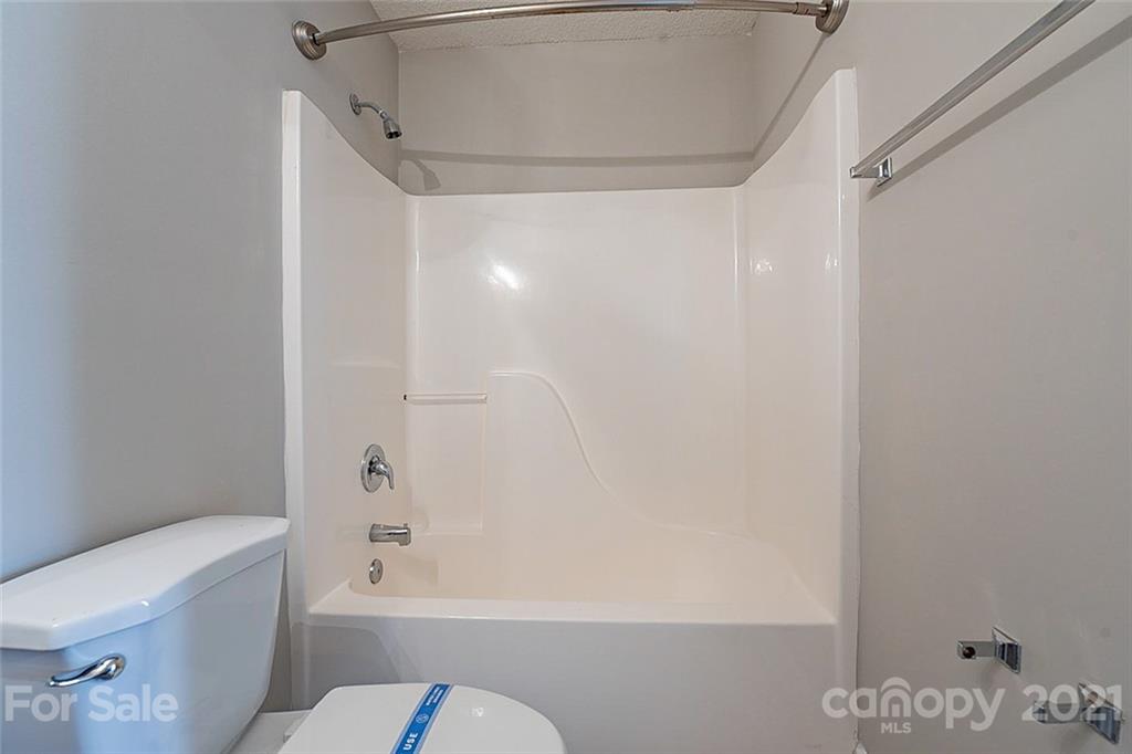 1665 Tate Road Rock Hill, SC 29732 - Photo 11 of 16 a bathroom with a bathtub and a toilet