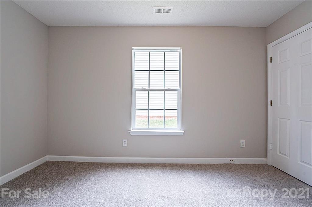 1665 Tate Road Rock Hill, SC 29732 - Photo 13 of 16 an empty room with a window